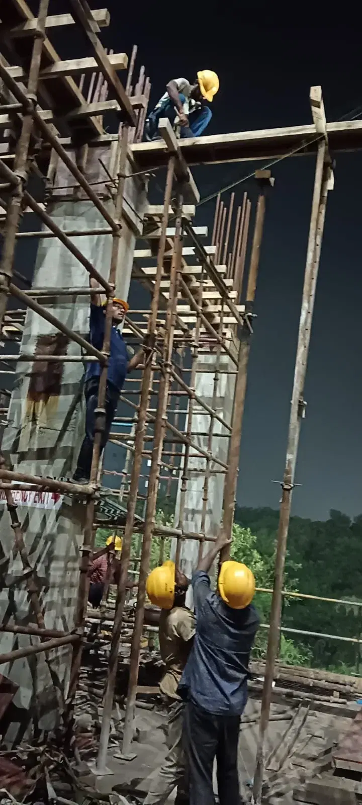 Workers on elevated structural formwork at KLJ Organic